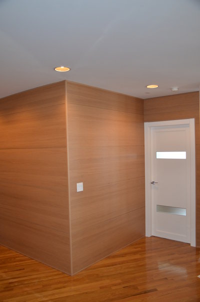 Wall panels in natural oak installed in hallway